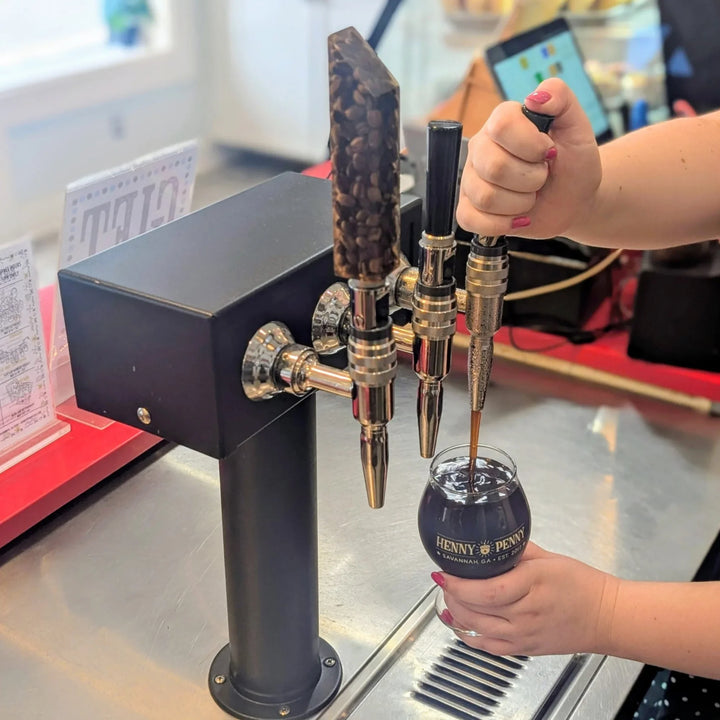 Pouring cold brew from the Infusion Pro Series switchable nitro tower.